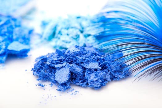 macro shot of blue make-up eyeshadows