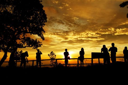 silhouette of photographers on the Mountain
