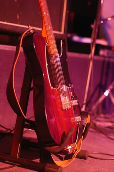 a guitar stand at a live concert