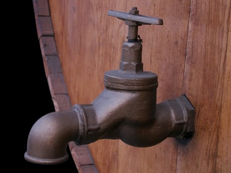 tap on wine barrel