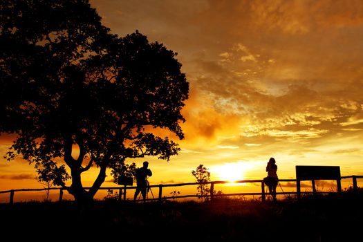 silhouette of photographers on the Mountain