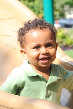 cute mixed race boy with a happy smile