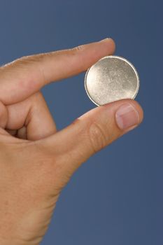 blank coin in hand



























