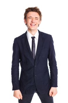 Portrait of happy teenage boy in a business suit. Isolated on white background.