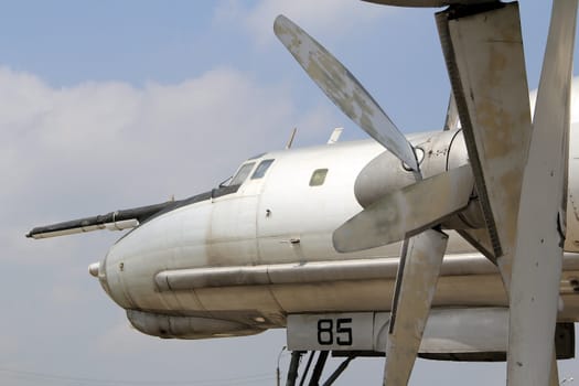 Strategic bomber propeller engine  against  cloudy sky background