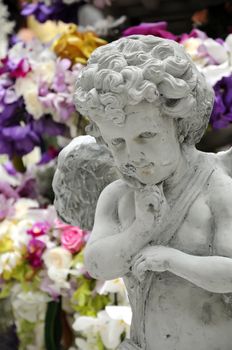 Statue of Cupid in a Garden 