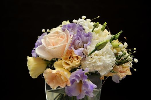 bouquet of flowers on black background.