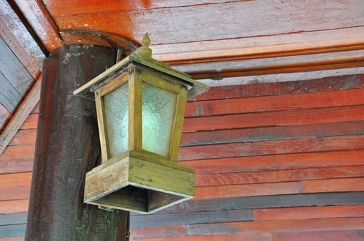 Old lamp made of wood