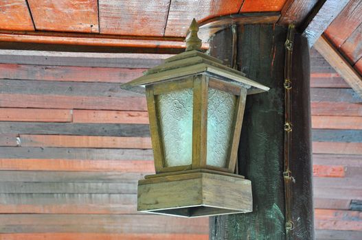 Old lamp made of wood