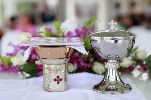 Wedding details inside a church at a Catholic wedding.