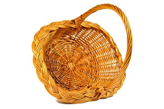 Emty wicker basket isolated on white background, closeup