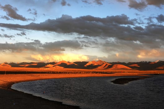 Landscape at lakeside in the highlands of Tibet at sunset