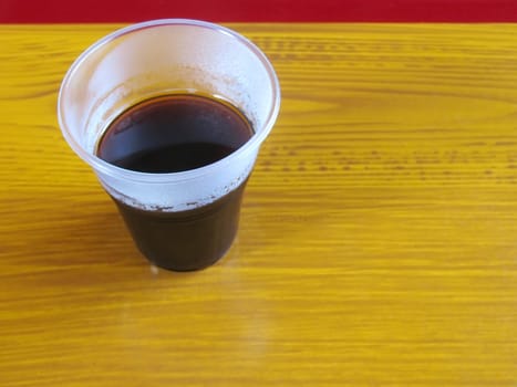 plastic cup of cheap coffee