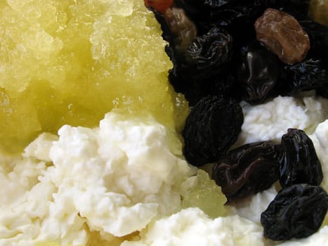 close up of curds with dried fruits and honey