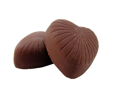 heart-shaped chocolates over white