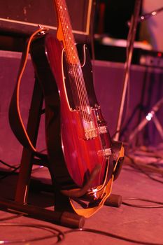 a guitar stand at a live concert