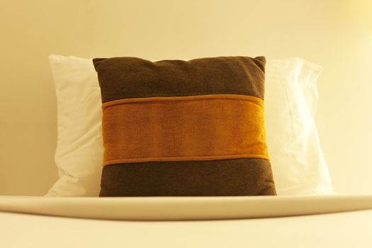 Set of confortable bed pillows in a hotel room