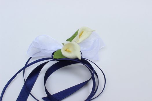 fine image of decorative flowers with ribbon on white background