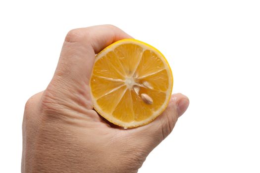 lemon in his hand on a white background