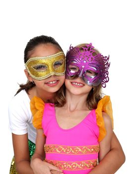 Two young girls with color carnival mask