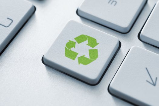 Recycle button on the keyboard. Toned Image.