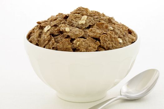 Delicious and nutritious bran flakes cereal, high in bran, high in fiber, served in a beautiful  French Cafe au Lait Bowl with wide rims.  This healthy bran cereal will be an aid to digestive health. 