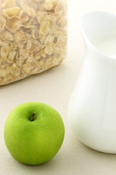 delicious and healthy packed sugar frosted cornflakes and milk jar