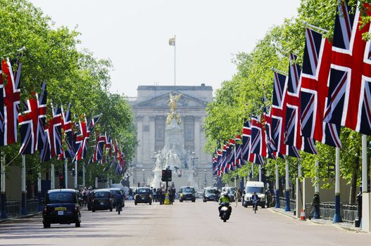 LONDON, UK - APRIL 28, 2011: The Mall is decorated with Union Jack flags in preparation of the Royal Wedding to be held the day after on April 28, 2011 in London.
