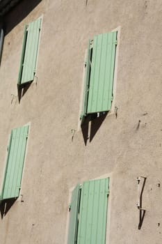 Windows of an old house in the Provence, France