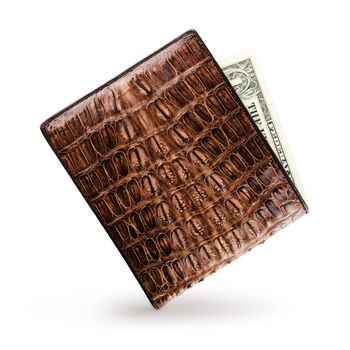 Wallet made ​​of genuine crocodile leather over white background