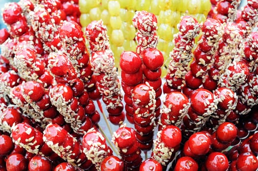 Traditional Chinese food,sugar-coated haws on a stick.