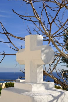 Symbol of the cross on top of a mountain