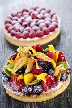 Fresh dessert tarts with assorted fruits and berries