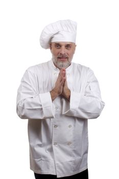 Portrait of a caucasian chef in his uniform on a white background.