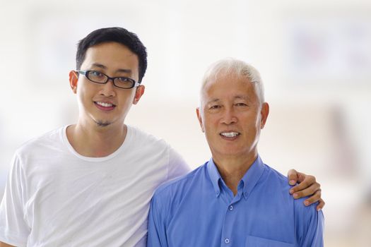 Asian Father and son portrait at indoor house