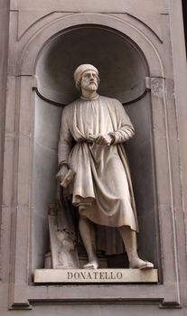 A statue of Donatello (Donato di Niccol� di Betto Bardi) sitting outside of the Uffizi, in Florence, Italy.  Donatello was an artist and sculptor during the Italian Renaissance.
