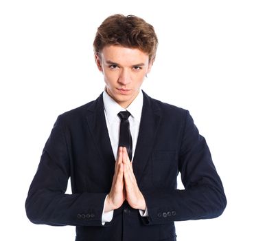 Portrait of a teenage boy in a business suit. Isolated on white background.