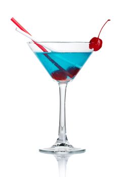 Blue alcohol cocktail in martini glass isolated on white background