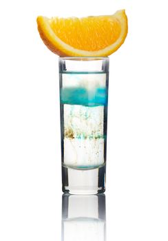 Short alcohol cocktail with orange slice isolated on white background