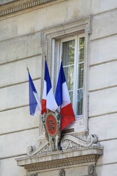 French Flags on the facade of a public building in Avignon, France