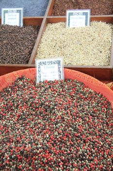 Different sorts of pepper on a market in the Provence, France