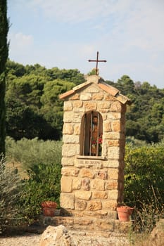 A small chapel in honor of Saint Joseph near a road in the Provence, France