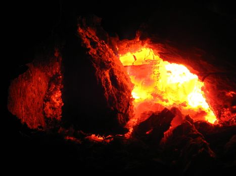 The image of heated coals in the furnace