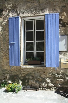 Window of an old house in the Provence, France