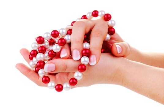 Beautiful hands with french manicure and feminine necklace on white background