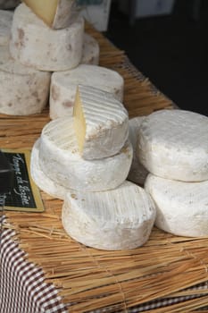 French cheese on display on a local market