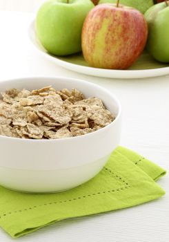 delicious and healthy granola or muesli with fresh organic apples and pears , with lots of dry fruits, nuts and grains.  