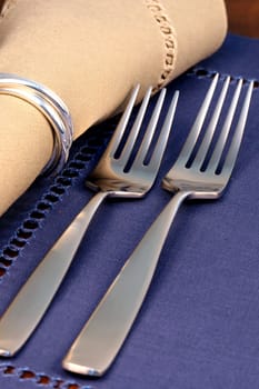 set of fine silverware on colorful table