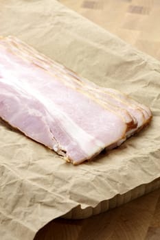 fresh bacon specially smoked and cured . very popular around the world and produced in dozens of delicious varieties.