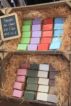 Bars of soap in various colors on a French market in the Provence